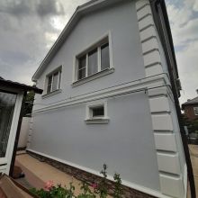 Утепление фасадов пенопластом.Отделка штукатуркой, камнем.
