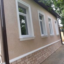Утепление фасадов пенопластом.Отделка штукатуркой, камнем.